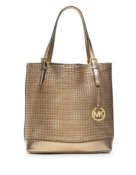 michael kors leather tote bag gold lining|Michael Kors large leather tote.